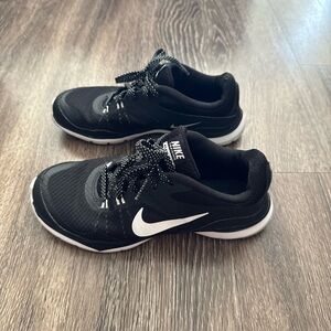 Black and white Nike sneaker tennis shoes